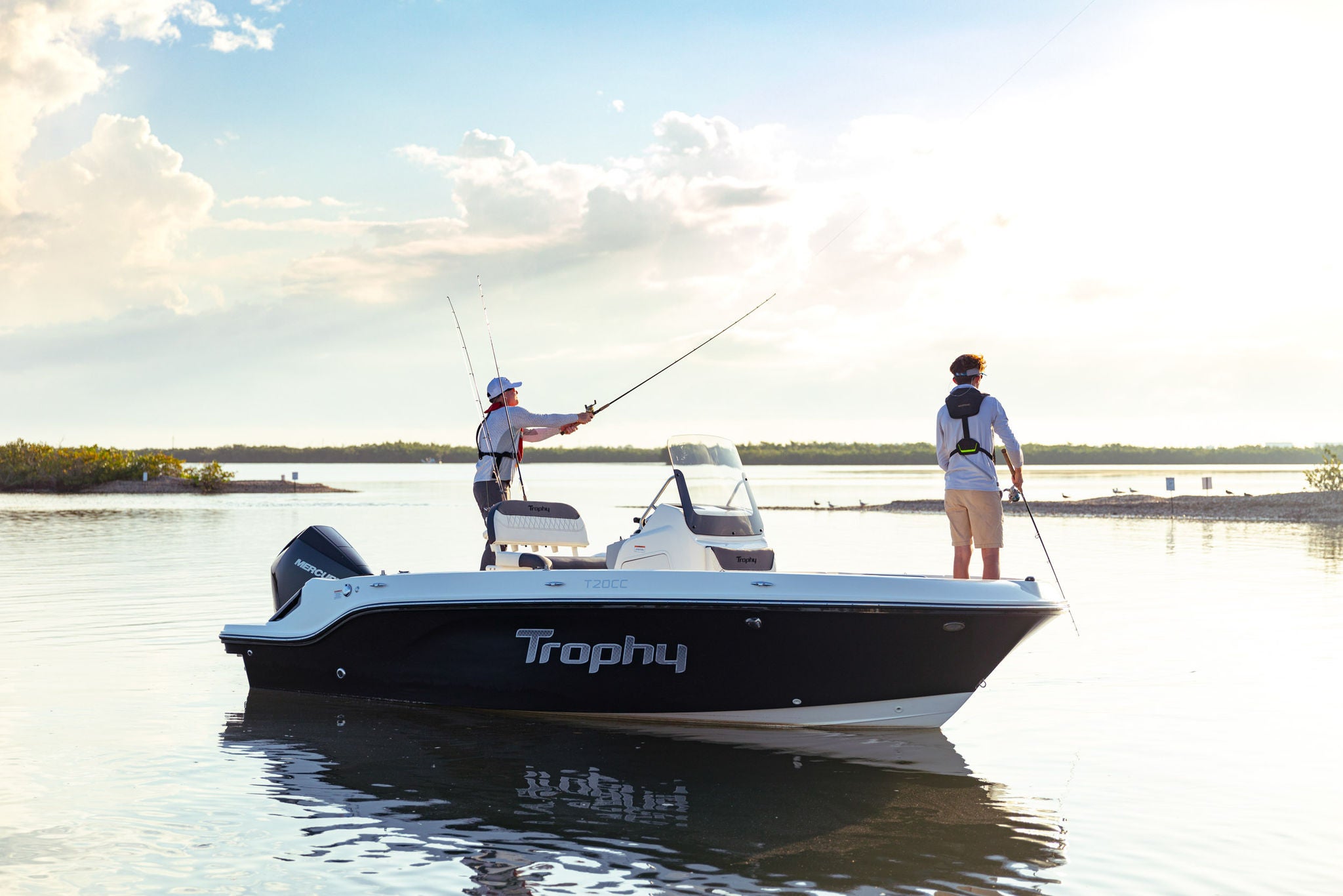 father and son fishing off the Trophy T20CC fishing boat