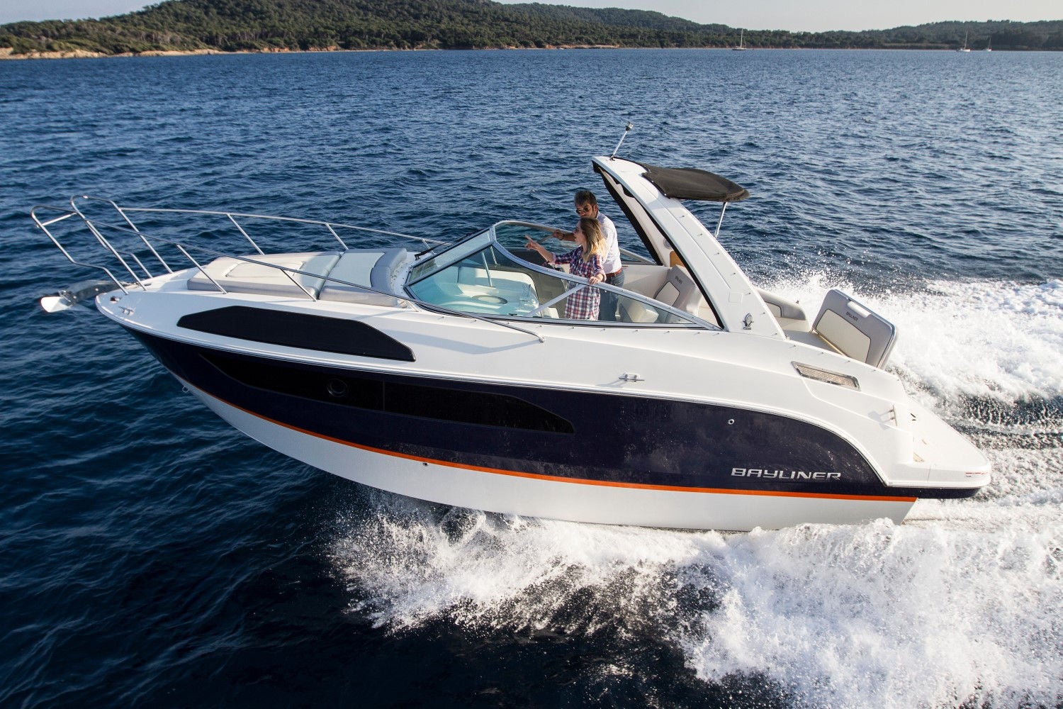 couple riding on the Ciera 8 overnight boat