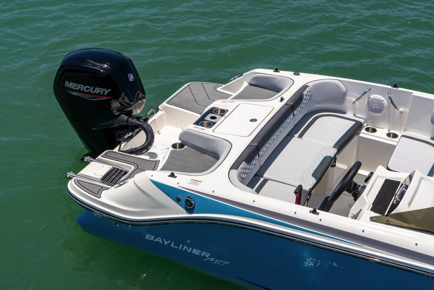 Mercury engine on the back of a M17 deck boat