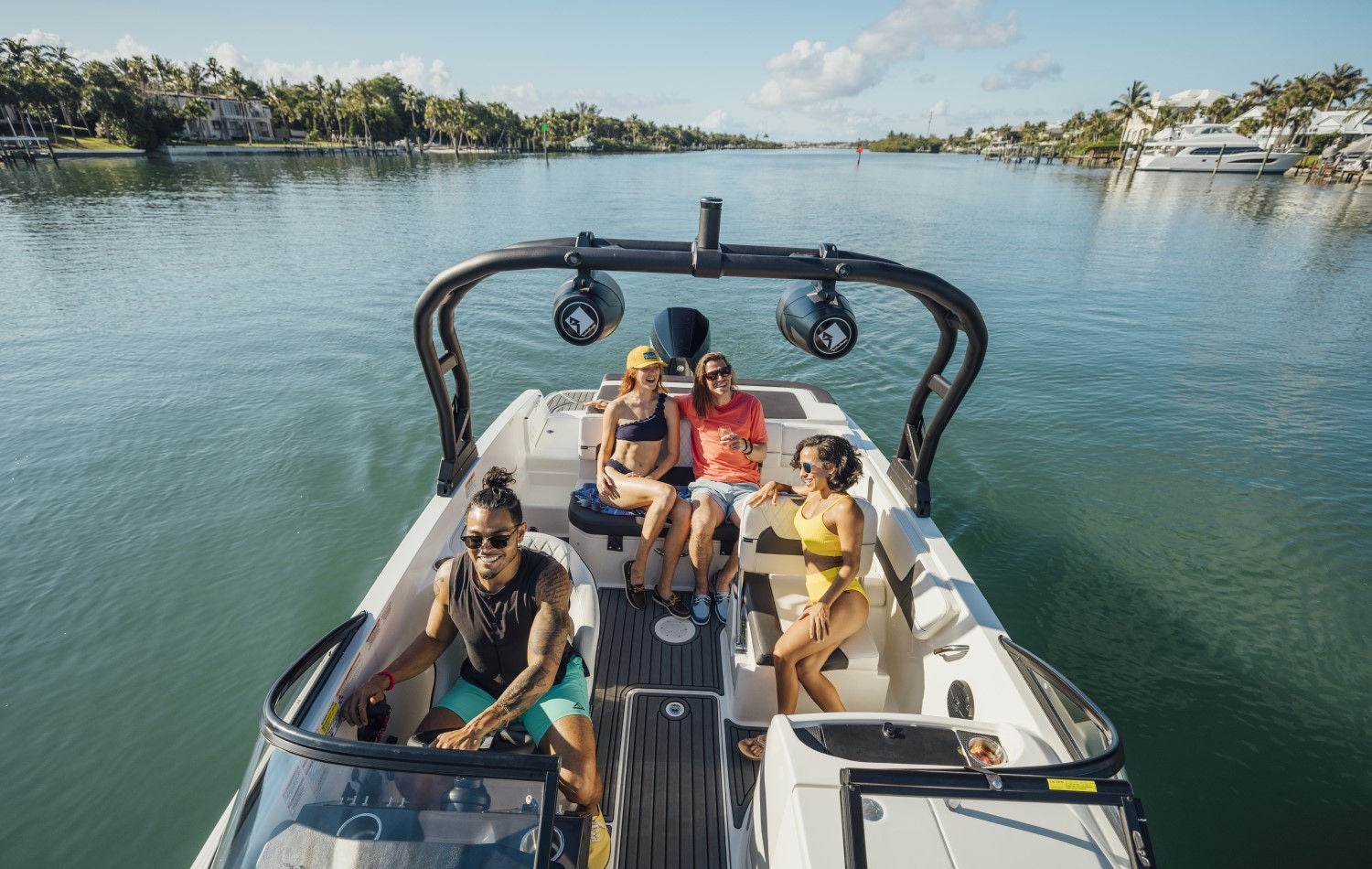 friends riding on a VR6 Outboard bowrider boat