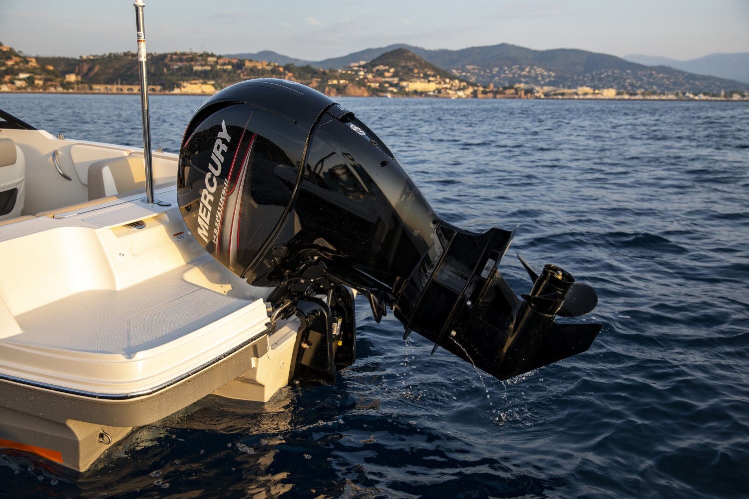 black Mercury engine on the back of a VR4 outboard bowrider boat