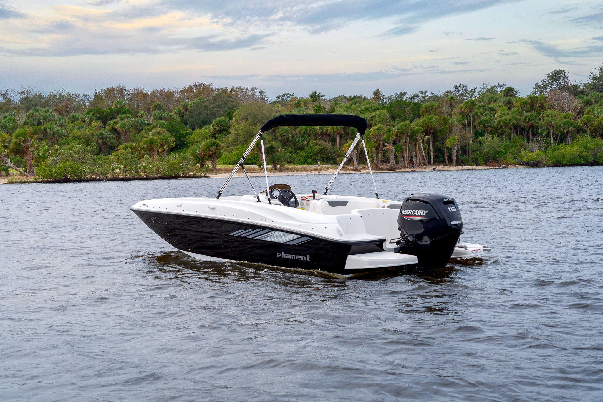 black Element E18 deck boat in a lake