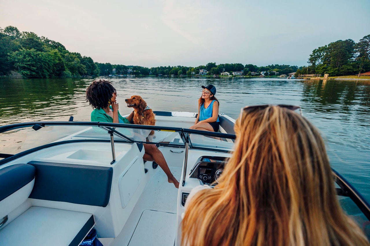 friends cruising in a D20i deck boat