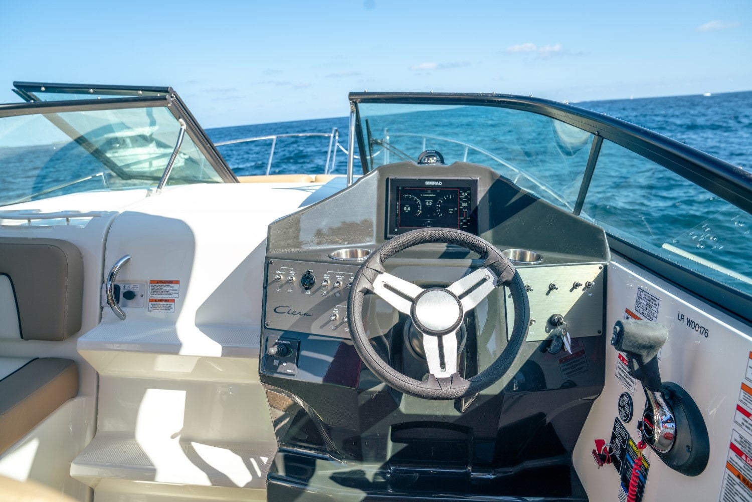 helm on the Ciera 8 overnight boat