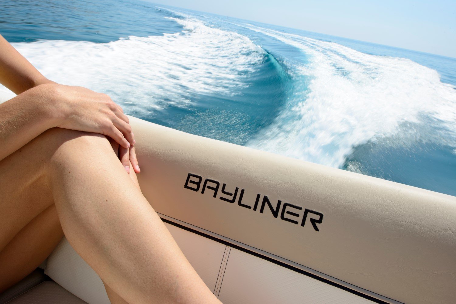 Bayliner logo on the seat cushion of the 742R overnight boat